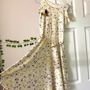 White dress with gold print